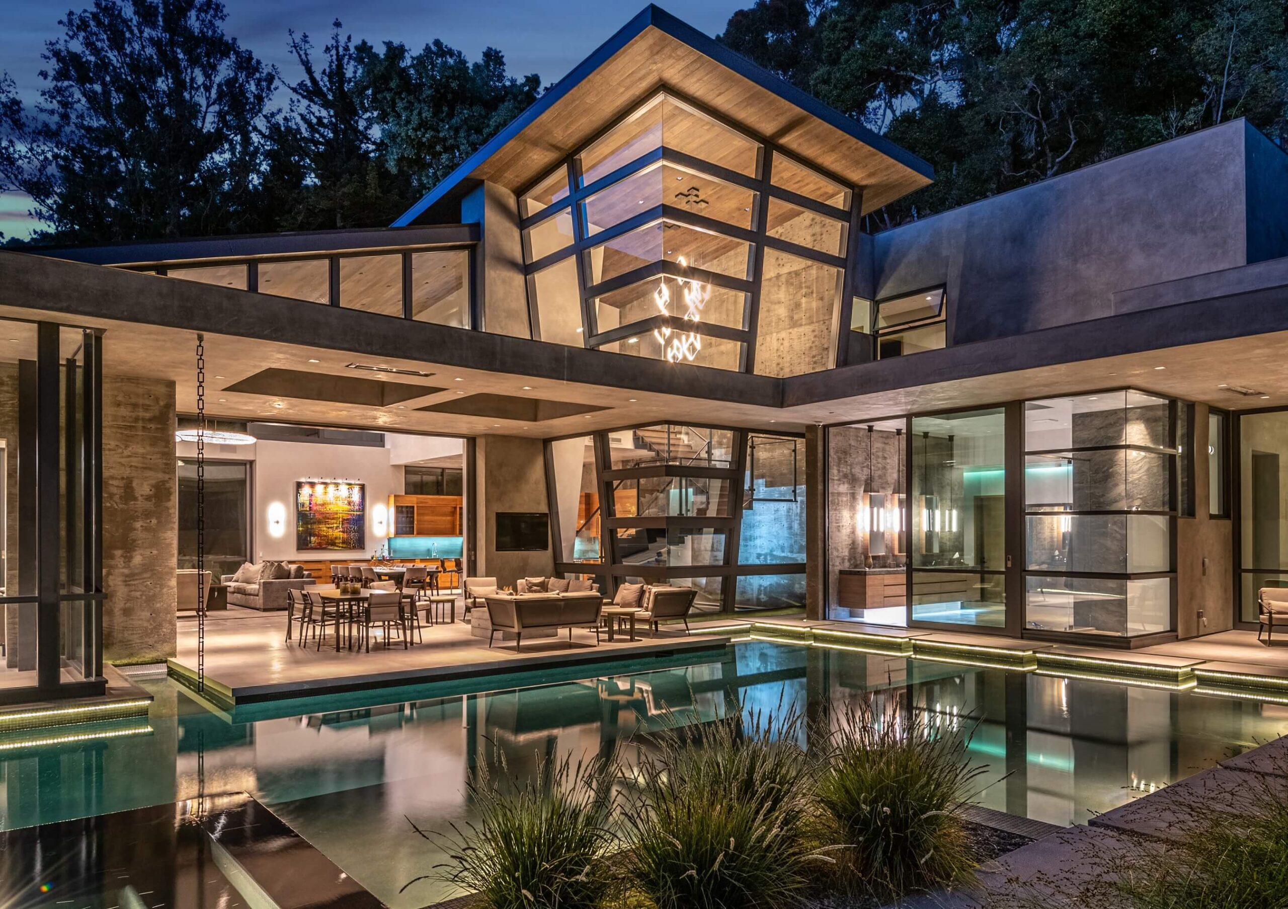 Latimer | Full Home view lit up at night | architectural design company Dean Larkin Design